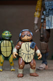 Teenage Mutant Ninja Turtles (The Last Ronin - The Lost Years) - Grammy April with Baby Yi & Moja 7" Inch Scale Action Figures - NECA